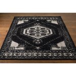 The Zahra Black hand-knotted rug by Surya showcases traditional inspired designs that exemplify timeless styles of elegance, comfort, and sophistication. Amethyst Home provides interior design, new construction, custom furniture, and area rugs in the Alpharetta metro area.