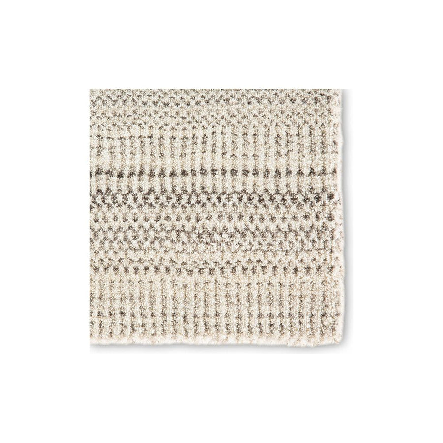 The Minuit TEI01 area rug from the Trendier collection brings dimension to any room with a finely detailed pattern in a neutral colorway. Soft to the touch, this hand-loomed wool and viscose rug is ideal for bedrooms, dining rooms, or any room you want to be more cozy and comfortable!