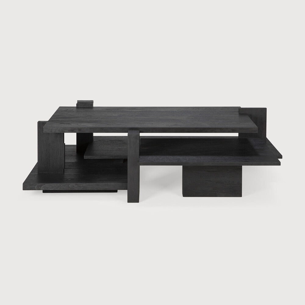 Inspired by the Dutch architectural movement de Stijl, the Teak Abstract Coffee Table is not only centered around style but also purpose. With its contemporary black finish discover new proportions and interest from every angle. Amethyst Home provides interior design services, furniture, rugs, and lighting in the Boston metro area.