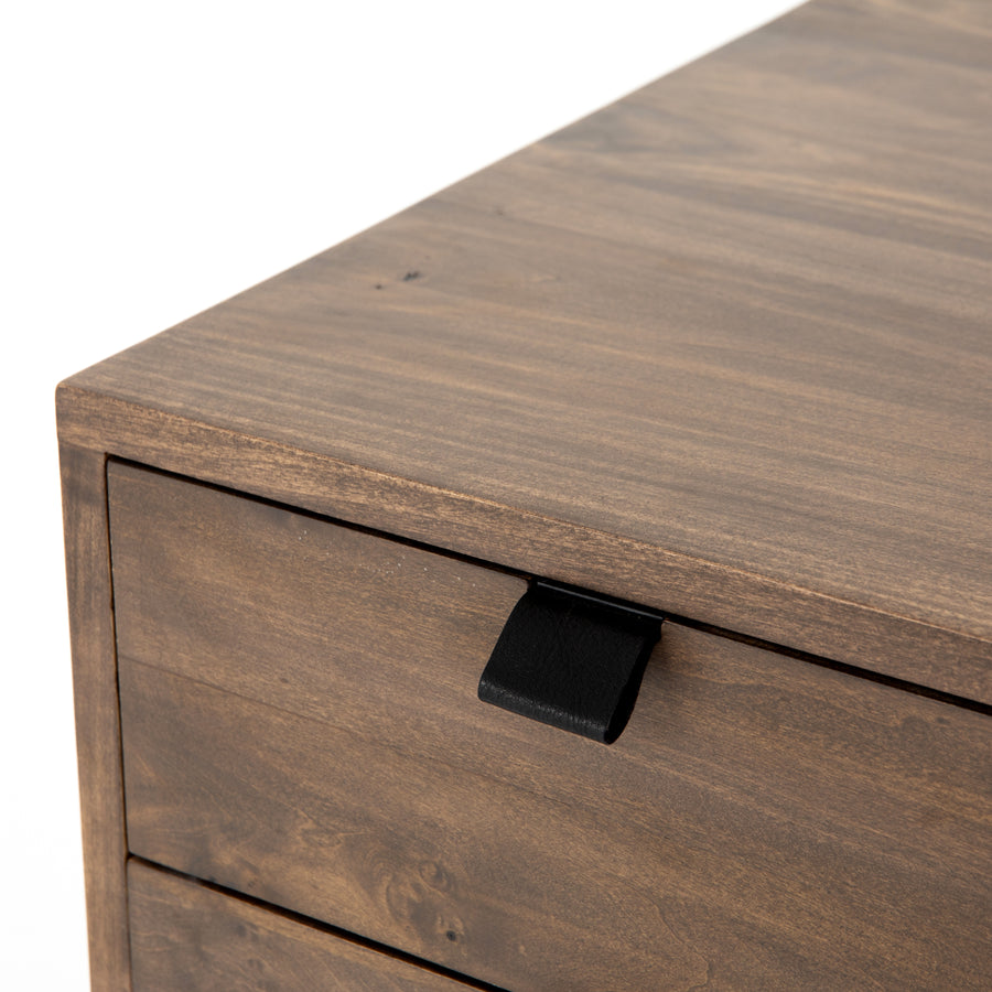 Inspired by clean mid-century design, the Trey Modular Filing Cabinet offers plenty of extra desk storage space. The cabinet is available in two colors, Auburn Poplar and a Black Wash Poplar. Metal-secured leather pulls add a textural element of surprise. Great solo or paired with matching desk or credenza.