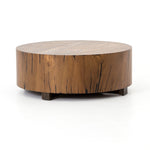 Stunning forces of nature are captured in the Hudson Coffee Table. We love how the palted primavera wood is hand-shaped into a cylindrical silhouette.   Overall Dimensions: 40"w x 40"d x 15"h  Materials: Yukas, Iron Materials: Iron, Primavera Materials: Iron, Thick Walnut Veneer
