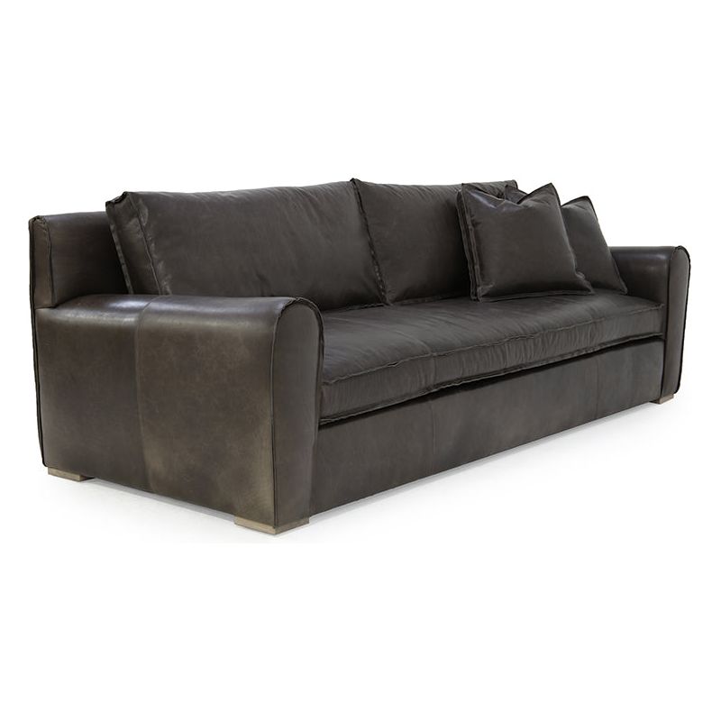 A timeless classic, our Gus Sofa Family comes standard with the following:  spring down seat construction loose bench seat cushion boxed back pillows toss pillows with 2″ boxing Please specify leather or fabric for arm patch detail. Please specify leg finish. Available as a sectional.