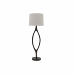 The Urbino Walnut Lamp is crafted from sustainably harvested hardwood by Verellen in North Carolina. The unique shape of the body paired with the oatmeal shade complements any room   Base: 16"w x 8"d x 62"h Overall Height: 76"h