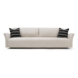 The Charlotte Sofa Family is a classic piece that gains elegance and relevance with a new minimal base. Made with a sustainably harvested hardwood frame, it comes standard with:  • upholstered and slipcovered • tight seat configuration • loose back configuration • 2″ H recessed wood base • knife edge toss