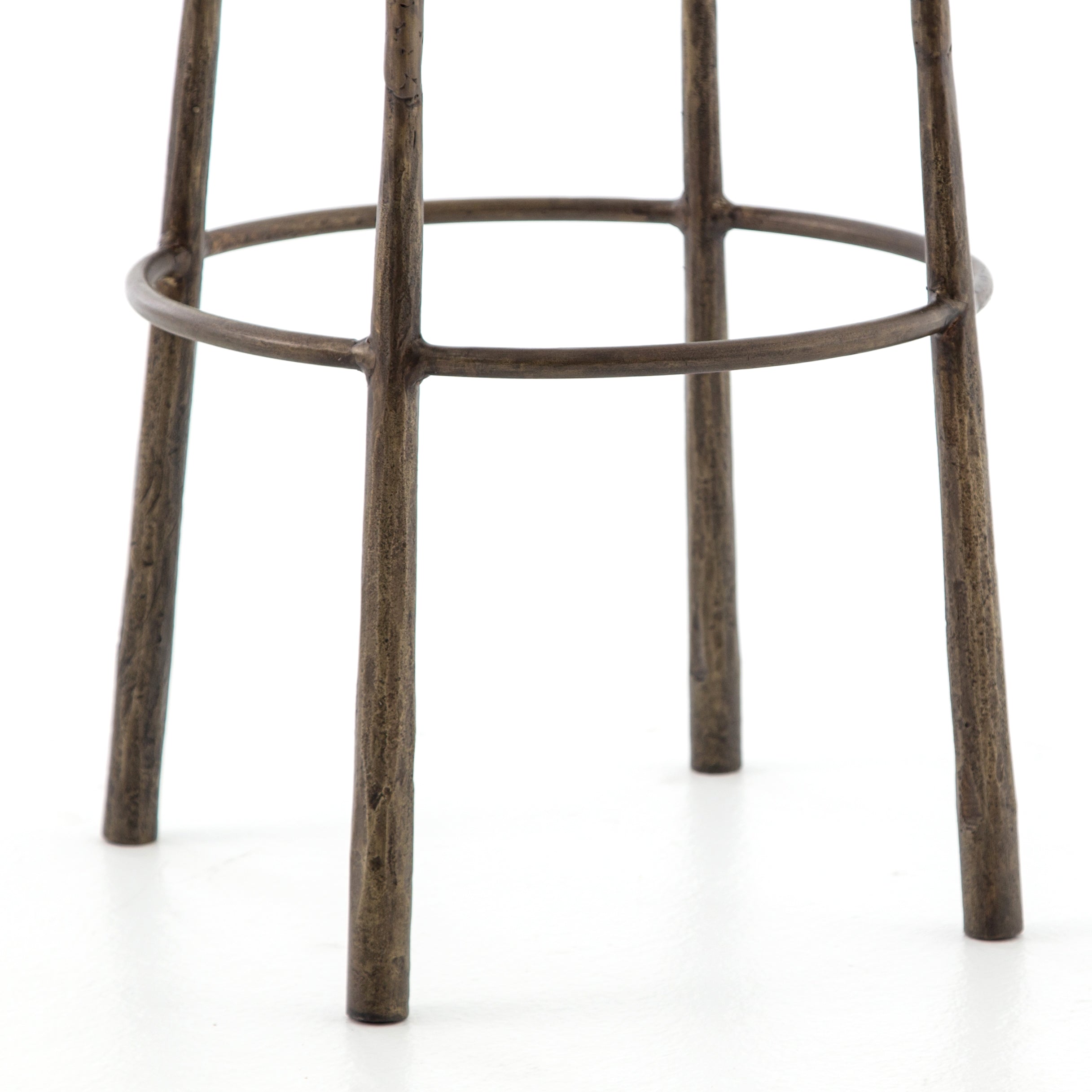 The Westwood Antique Brass Bar + Counter Stool have stunning hammered iron legs for a rich, rough look.   Counter Stool: 16"w x 16"d x 26.25"h Bar Stool: 16"w x 16"d x 30"h  Materials: Iron