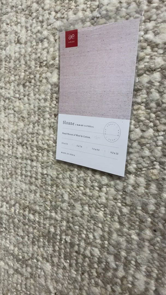 A perfect blend of refined and relaxed, the Sloane Collection is hand-woven of wool, cotton and polyester by artisans in India. Sloane offers a sophisticated foundation for a contemporarily bohemian look with perfectly woven stripes and minimalist appeal.  Hand Woven 79% Wool | 11% Cotton | 7% Polyester | 3% Other Fibers SLN-01 Oatmeal