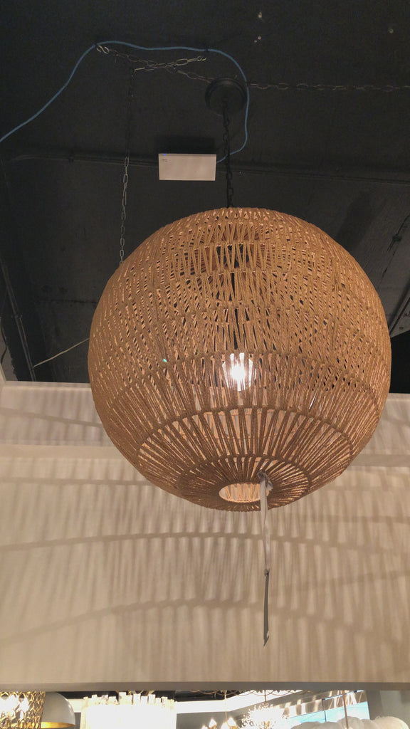 With a relaxed, Cali-cool vibe, the Seaside Pendant Large adds natural texture to any interior design. Thin jute is wrapped atop a natural-toned, metal globe in a pattern intended to let light shine through and out.    Overall Dimensions: 26"w x 26"d x 30"h
