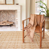 The Campbell Sand Rug relief pattern plays across a gently marled woven wool ground, accentuating the graphic dimension created by the different weaves. The central motif is repeated inversely to create a border around this sumptuous rug. Amethyst Home provides interior design services, furniture, rugs, and lighting in the Omaha metro area.