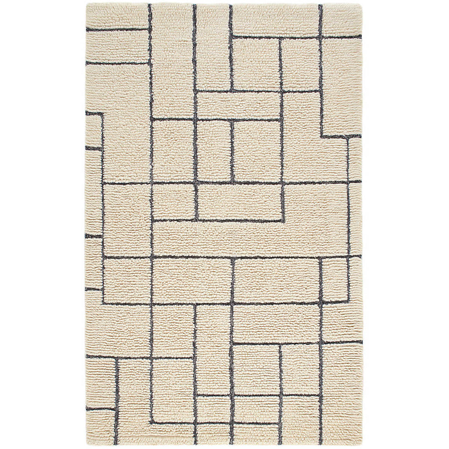 Wooly and soft, the enviable texture of this densely shaggy wool rug is a unique statement of pure, natural beauty. High pile tufts are hand-worked into blocks filled with corded furrows to create a rich, cozy, and layered landscape. Bold intersecting lines of woven nubby, marled Charcoal bring contrast and graphic structure to the Ivory softness. Amethyst Home provides interior design services, furniture, rugs, and lighting in the Salt Lake City metro area.