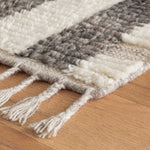 The Everett Ivory/Grey Rug stripes in Ivory create corded, ribby fields. Interwoven with low, undyed Taupe boundary lines and juxtaposed with high contrast raised bands of naturally colored mélange charcoal. A natural braided Taupe fringe adds a bohemian air of whimsy. Amethyst Home provides interior design services, furniture, rugs, and lighting in the Monterey metro area.