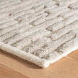 The Gates Plaster Rug sophisticated hand-knotted wool rug demonstrates unique textures inspired by nature. The luxe labyrinth is hand-knotted with lush wool to make a raised grid pattern of plushness, then hand sheared. The resulting subtle variations of pile height are only found in artisanally produced rugs. Amethyst Home provides interior design services, furniture, rugs, and lighting in the Kansas City metro area.