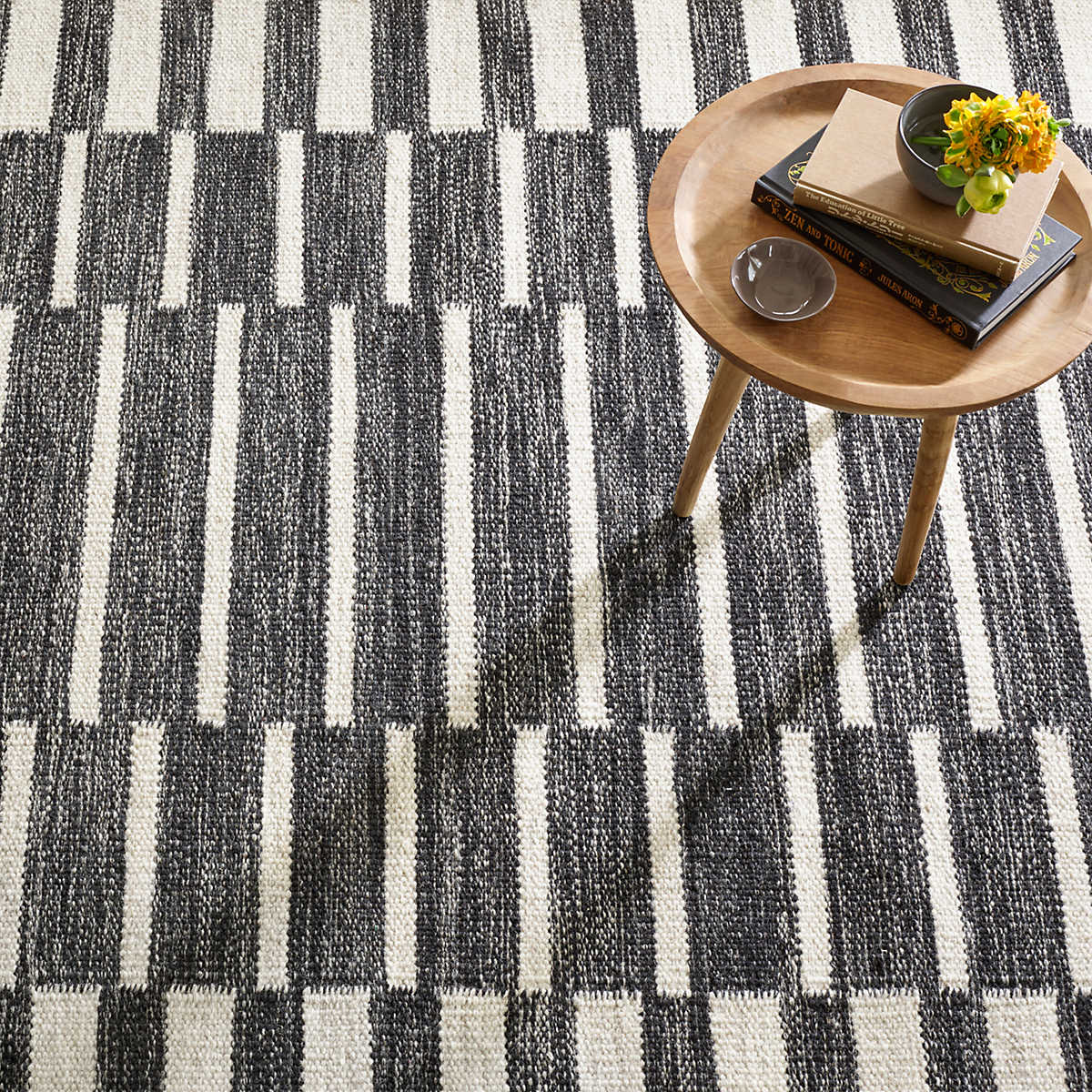 The Heights Charcoal Rug creates the illusion of layers with this gorgeous chunky, flatwoven wool rug. Concentric rectangles of offset ladder stripes make a bold graphic statement. Hand-loomed by artisans from undyed natural fleece wool in marled shades of Charcoal and Ivory. Amethyst Home provides interior design services, furniture, rugs, and lighting in the Des Moines metro area.