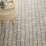The Roark Pewter Blue Rug design of this luxurious, plush wool rug conjures surfaces of ancient hand-laid rock walls. The contrast between stone and mortar is further represented by the meticulously tufted high and low levels of the velvety hand-sheared pile. Amethyst Home provides interior design services, furniture, rugs, and lighting in the Miami metro area.