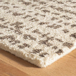The Shepherd Pebble Rug deeply dense and cushy pile serves to highlight the beauty of the unbleached color variations of natural wool fleece. The random stippling of irregularly shaped splotches is a signature motif of Marie Flanigan, an award-winning interior designer. Amethyst Home provides interior design services, furniture, rugs, and lighting in the Salt Lake City metro area.