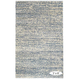 The Shepherd Pewter Blue Rug deeply dense and cushy pile serves to highlight the beauty of the unbleached color variations of natural wool fleece. The random stippling of irregularly shaped splotches is a signature motif of Marie Flanigan, an award-winning interior designer. Amethyst Home provides interior design services, furniture, rugs, and lighting in the Omaha metro area.
