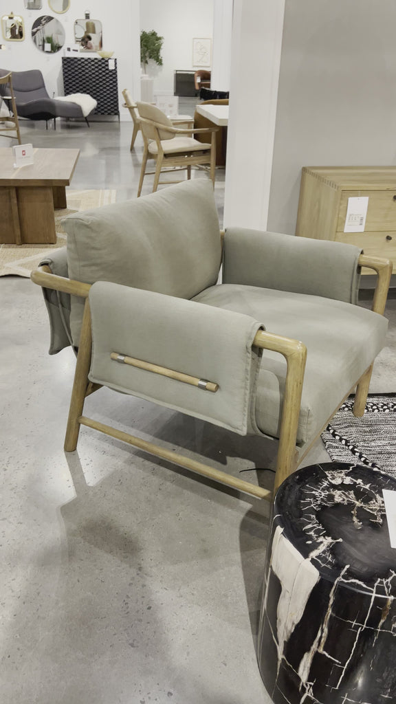Details make this Harrison Chair - Villa Olive. With plush cotton-blend upholstery that wraps each arm, faux toggles add an element of interest to luxuriously comfortable mid-century-inspired seating in a light olive hue, with softly sculpted parawood framing carrying out a beautifully neutral look.  Overall Dimensions: 32.25"w x 34.75"d x 31.75"h