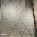 A tonal approach to Moroccan-inspired rugs, the Bodhi Ivory / Natural BOD-01 rug from Loloi is hand-woven of 100% jute. This rug features linear and braided details, creating natural variations that make a subtle yet striking statement for an entryway, living room, hallway or kitchen runner, or dining room. Amethyst Home provides interior design, new construction, custom furniture, and rugs for the Omaha and Lincoln, Nebraska metro area.