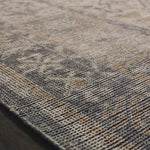 Bring a touch of antiqued beauty into your home with the Heirloom Bone / Charcoal rug from Loloi. This wool rug tastefully honors the art of hand knotted rugs. The rug evokes a sense of unique sophistication with its traditional Serapi rug color palettes and vintage design.