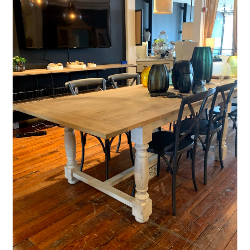 Inspired by the 19th Century French Farm Table, the Bezier Dining Table is redesigned to fit the modern home. The table is made of an oak top with spacious overhanging and white painted pine legs. The Bezier accommodates up to 10 people and fits beautifully in a vintage cabin or modern style home.  Size: 39.4" w x  133.9" l x 30.3" h Materials: Birch Wood, Oak
