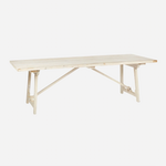 The Campaign Dining Table is a gorgeous light whitewashed color made of natural pine. The legs have a unique, geometric shape and is sure to make a statement in any dining room.  Size: 96"w x 30"h x 36"d Materials: Pine 