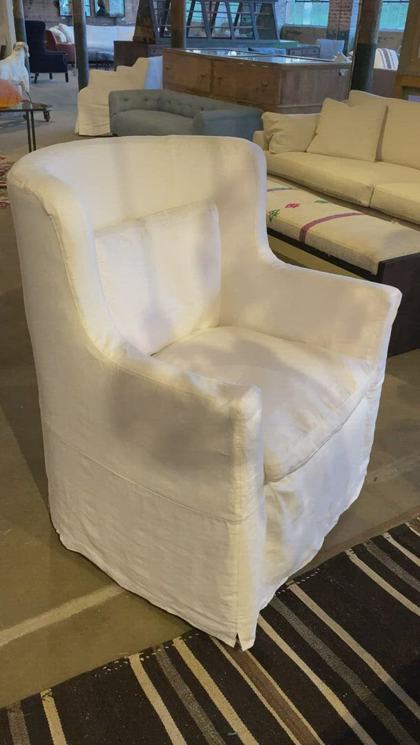 The Havana Wing Chair by Cisco Brothers has a tall back with gorgeous curved arms. The go-to chair for guests or your favorite chair to read your latest novel in -- this will complete the look for any living room or lounge area. Shown in slipcover Otis White and Bellamy Oatmeal.   Overall Dimensions: 32"w x 40"h x 32"d Seat Height: 18" Seat Space: 22"w x 17"d 