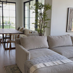 A modern, tailored sofa made with the right stuff -- the Louis 2 Piece Sectional - Essentials is a classic, updated silhouette that is stunning in Cisco Brothers' curated fabric selection.  It’s two-over-two cushions provide the perfect seating to catch up with old friends or entertain new ones. Photographed in Logan Silver, Mariet Natural, and Logan Grey.   Overall: 121"w x 68"d x 31"h