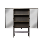 This Darko Wall Unit Cabinet  by Cisco Brothers is a dream. With adjustable shelves and mirrors that reflect beautifully, we'd love to see this featured in a bedroom, living room, or other space of your home!  Overall: 36”w 65”h 17"d Materials: Metal, Mirror Finish: Black Rust   Your custom Cisco Brothers piece is made just for you in California! Please allow 8-16 weeks for production.