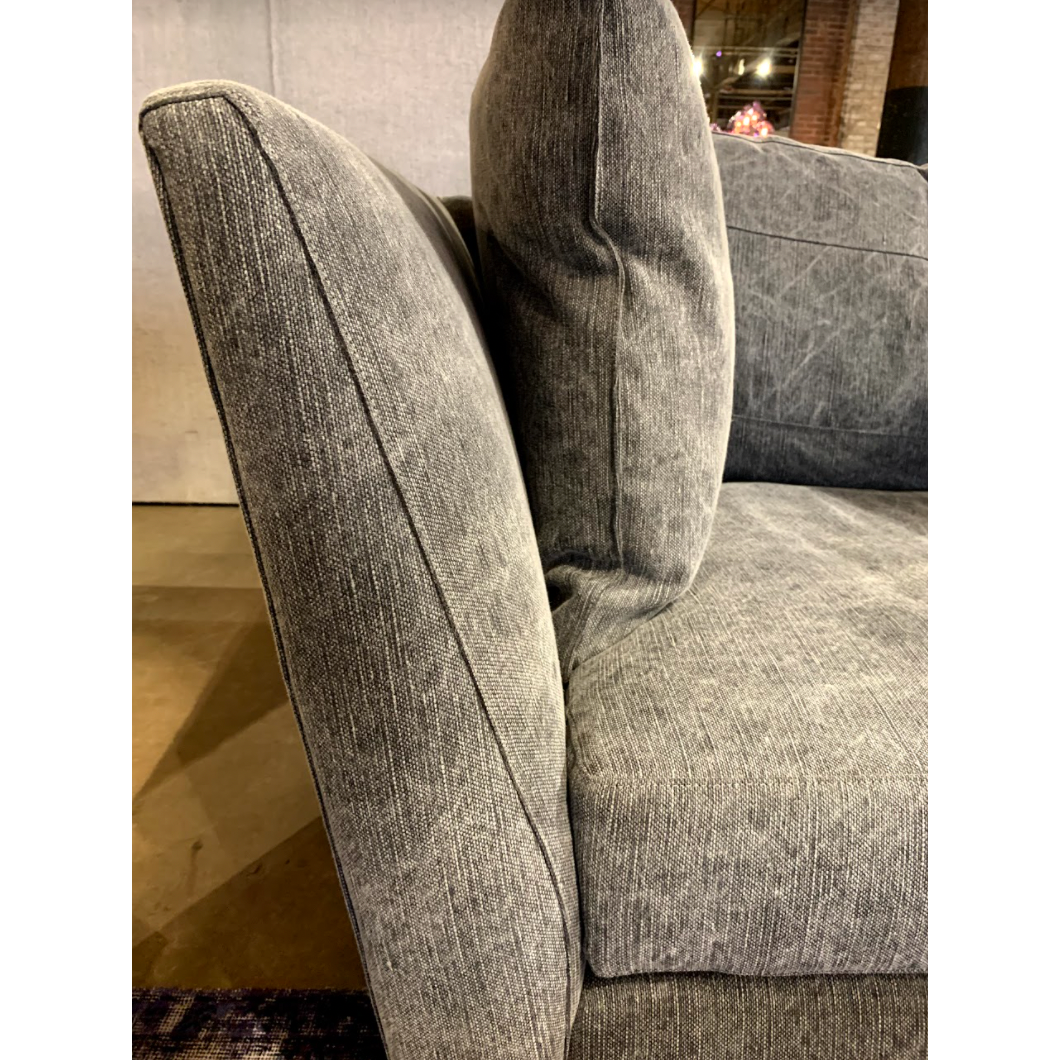 The Seda Sofa  - Custom embodies a blithe, carefree coastal spirit. It’s simple silhouette is accented with a kick pleat bottom for a hint of refinement. It’s wide, open arms and ample bench seat invite you to take it easy and just enjoy. This comes upholstered or slipcovered. 
