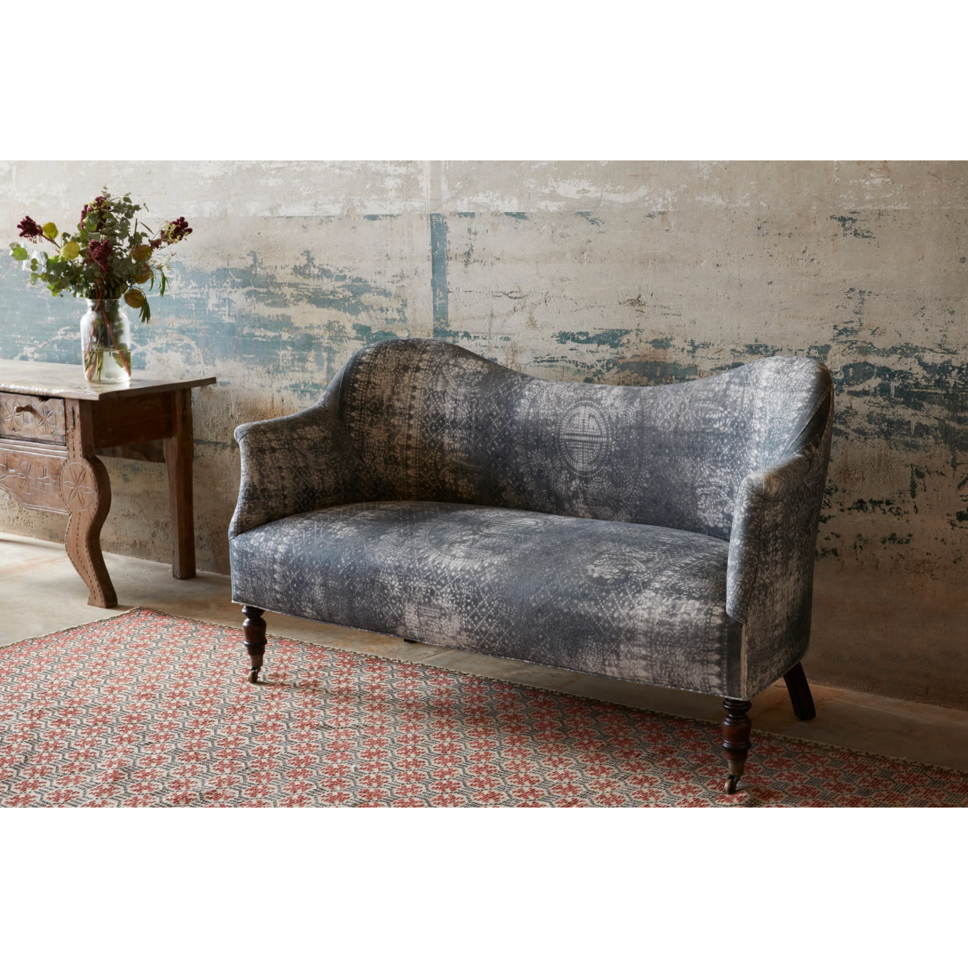 We love the curved back and high arms found on this Dromedary Sofa - John Derian by Cisco Home. We'd love to see a pair of these in featured in your living room -- sure to be your new favorite reading spot! Overall: 56"W x 33"H x 26"D