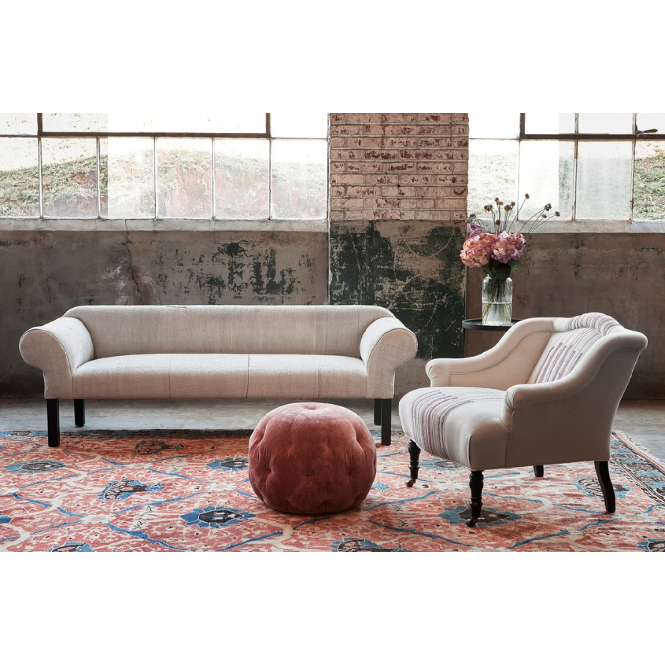 We love the chunky, rolled arms of this Teddy Sofa - John Derian by Cisco Home. With a clean bench seat, this will be a staple furniture piece in your home for years to come!   Overall: 78"W x 27"H x 26"D Sitting Space: 63.5"W x 20"D Seat Height: 19"h Arm Height: 26.5"h Weight: 95lbs Leg: 9.75"h