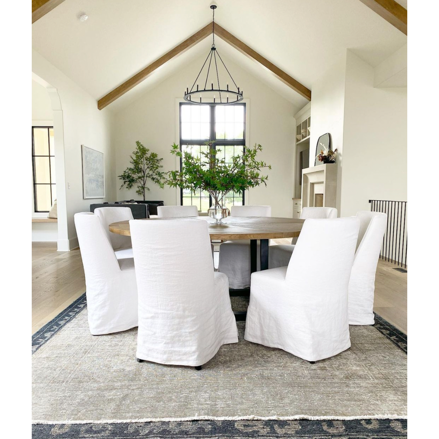 The Craig Dining Chair is featured in a gorgeous white linen slip cover in a Belgian wrinkle.  Size: 19"w x 23"d x 35"h Seat Height: 20"h