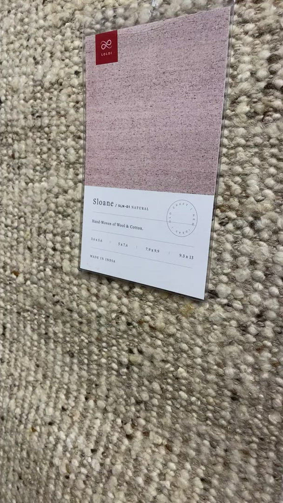A perfect blend of refined and relaxed, the Sloane Collection is hand-woven of wool, cotton and polyester by artisans in India. Sloane offers a sophisticated foundation for a contemporarily bohemian look with perfectly woven stripes and minimalist appeal.  Hand Woven 77% Wool | 11% Cotton | 9% Polyester | 3% Other Fibers SLN-01 Natural