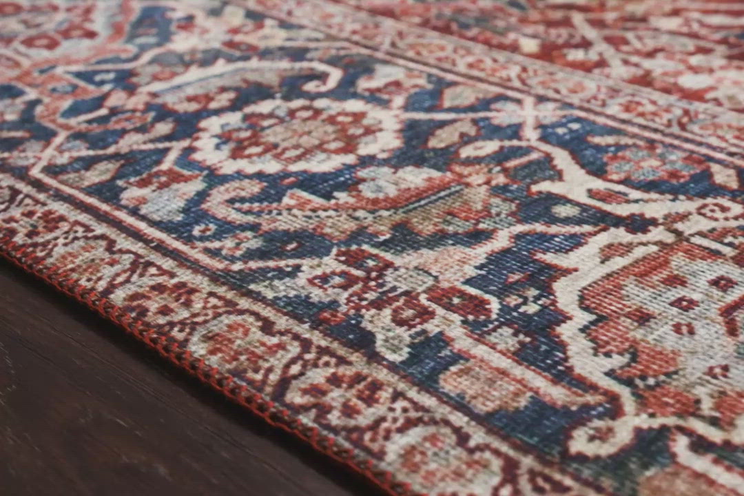 The Layla rug collection from Loloi is traditional and timeless, with a beautiful lived-in design that captures the spirit of an old-world rug. This traditional power-loomed rug is crafted of 100% polyester with a classic and sophisticated color palette and subtle patina.  Power Loomed 100% Polyester LAY-08 Red/Navy Colors: Red, Navy, Blue, Ivory