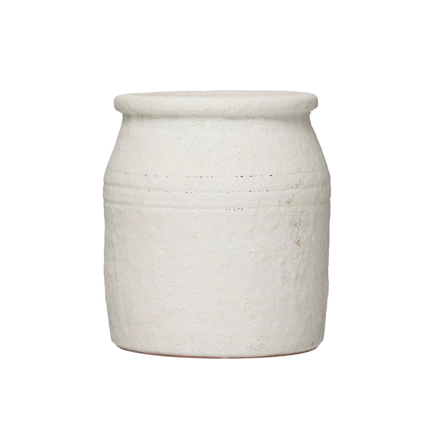 A textured volcano glaze makes this Distressed Terracotta Crock stand out from the rest — we love this as a stunning centerpiece or an additional to a bookshelf.  Size: 6.25" Round x 7"H