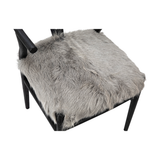 We love the textures the natural fur bring to the space with this Kara Dining Chair. Place in your dining room or use as a desk chair to spice up the space! OAK WOOD NATURAL FUR SEAT HEIGHT 19 Size: 22"l x 23"d x 31"h 