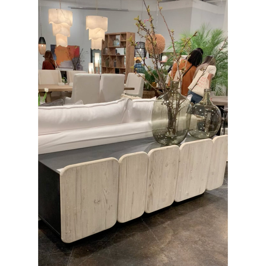 We love the rounded edges and different size doors of this Nubla Sideboard. The grey white antique finish brings an antique vibe to modern spaces.  Reclaimed Pine on Iron Frame Grey White and Antique Black Finish
