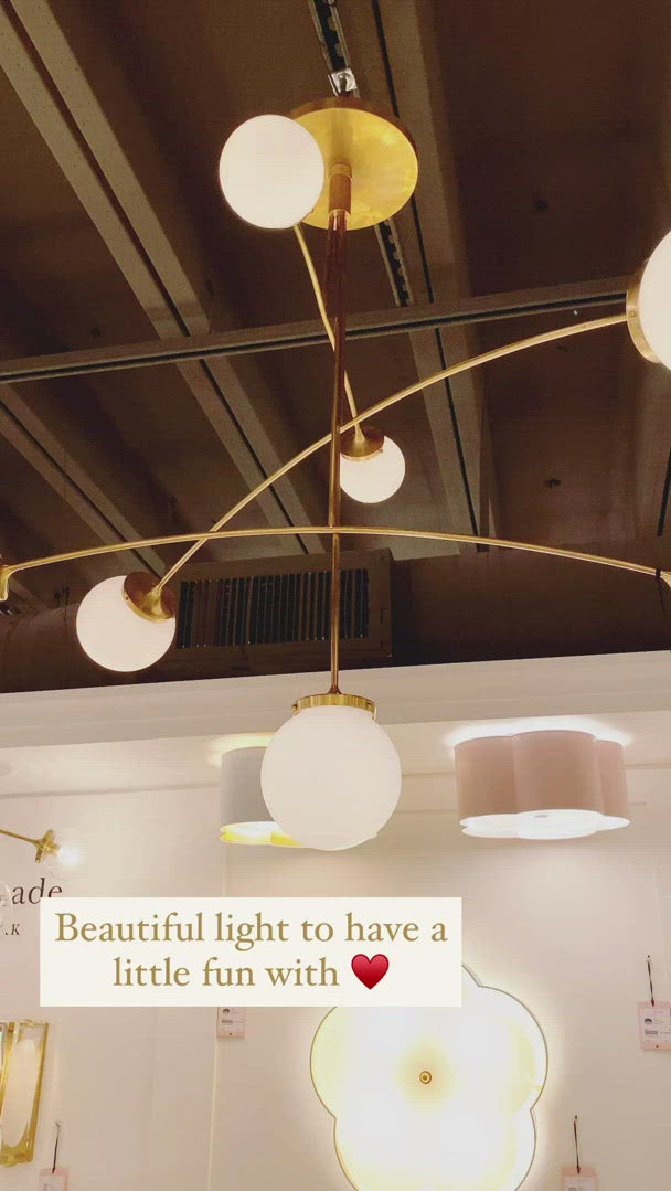 We find art in a chandelier with the arms of this Prescott Medium Mobile Chandelier by Visual Comfort. Add to your living room, kitchen, or other large area to bring a unique, modern feel to your space. 