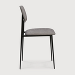 This DC Dining Chair is beautiful, minimalistic metal silhouette that would add an air of elegance to your dining table or kitchen. We love the details of the angled metal and the simplicity of this stunning chair.  Dimensions: 17"w x 19"d x 32.5"h  Weight: 19 lbs  Seat Height: 20"  Material: Metal Finish: Light Grey Upholstery