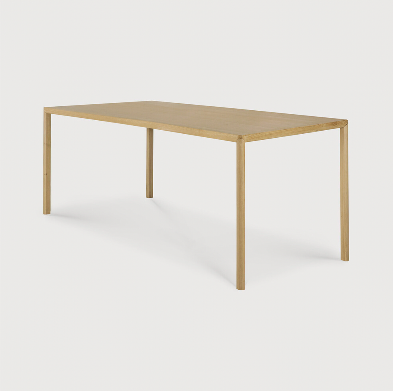 With a simple, clean and minimal design, this Oak Air Dining Table is a table to add your dining room or kitchen area of years to come. The sleek bevelled legs makes the tabletop seems to float effortlessly above.   Material: Oak, 100% Solid Wood Finish: Varnished