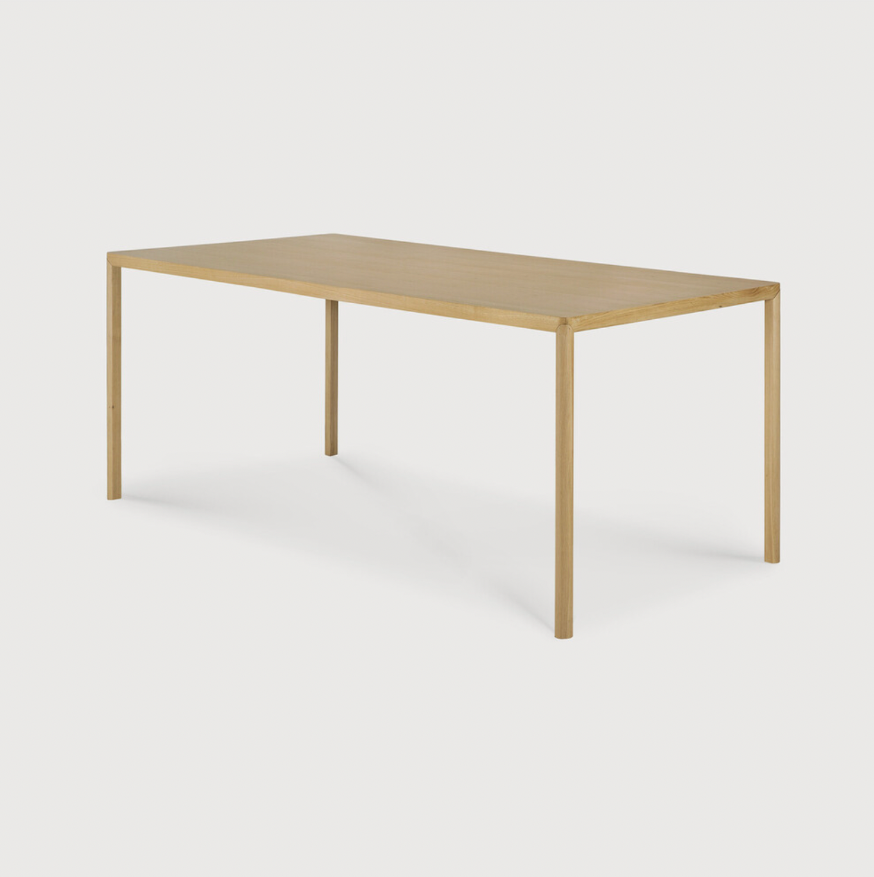 With a simple, clean and minimal design, this Oak Air Dining Table is a table to add your dining room or kitchen area of years to come. The sleek bevelled legs makes the tabletop seems to float effortlessly above.   Material: Oak, 100% Solid Wood Finish: Varnished