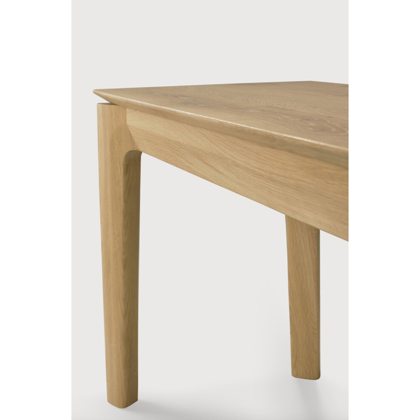 This Oak Bok Bench features an airy shape with rock-solid construction,  making this piece a timeless and remarkable design to enjoy for years to come. Pair with a dining table or stand-alone against a wall, hallway, or end of the bed!  Material: Oak Finish: Oiled