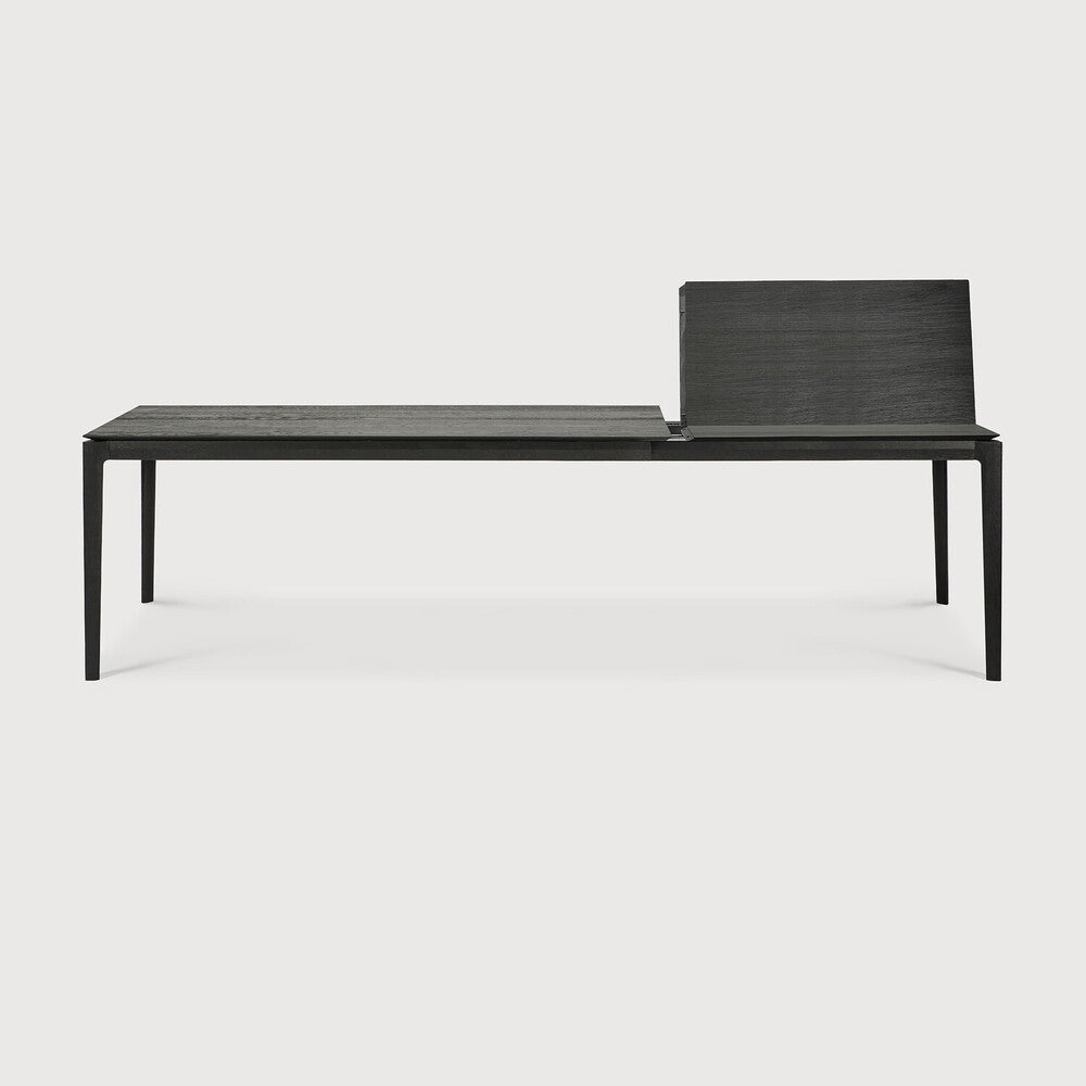 Featuring Oak Bok Extendable Dining Table - Black by Ethnicraft at Amethyst Home. This Oak Bok Extendable Dining Table is perfect for families who want extra space when their kids, extended family, or guests come to celebrate! Its airy shape yet rock solid construction make this piece a timeless and remarkable design to enjoy for years to come.
Dimensions.  Amethyst Home provides interior design, new home construction design consulting, vintage area rugs, and lighting in the Alpharetta metro area.