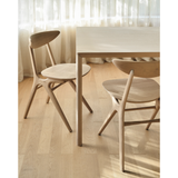 We love the Oak Eye dining chair and its sleek, angular, front legs and flowing smooth connections. The curved backrest, reminiscent of a winked eye, inspired the name of the chair and we imagine this playful yet elegant chair in any dining room or kitchen. Designed by Alain van Havre.  Dimensions: 19.5"w x 22.5"d x 30.5"h  Weight: 13 lbs  Seat Height: 18" Contract Grade  Material: Oak, 100% solid wood Finish Options: Oiled