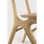 We love the Oak Eye dining chair and its sleek, angular, front legs and flowing smooth connections. The curved backrest, reminiscent of a winked eye, inspired the name of the chair and we imagine this playful yet elegant chair in any dining room or kitchen. Designed by Alain van Havre.  Dimensions: 19.5"w x 22.5"d x 30.5"h  Weight: 13 lbs  Seat Height: 18" Contract Grade  Material: Oak, 100% solid wood Finish Options: Oiled