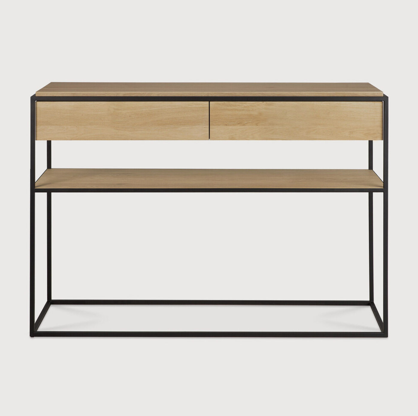 Balance and function come together in the Monolit console table. This simple, sleek table includes storage and we LOVE hidden storage! Dress up your living room or office with a piece that is both functional and stylish!  Dimensions: 48.5"w x 16"d x 33.5"h  Weight: 77 lbs  Material: Oak, 100% solid wood Finish: Oiled