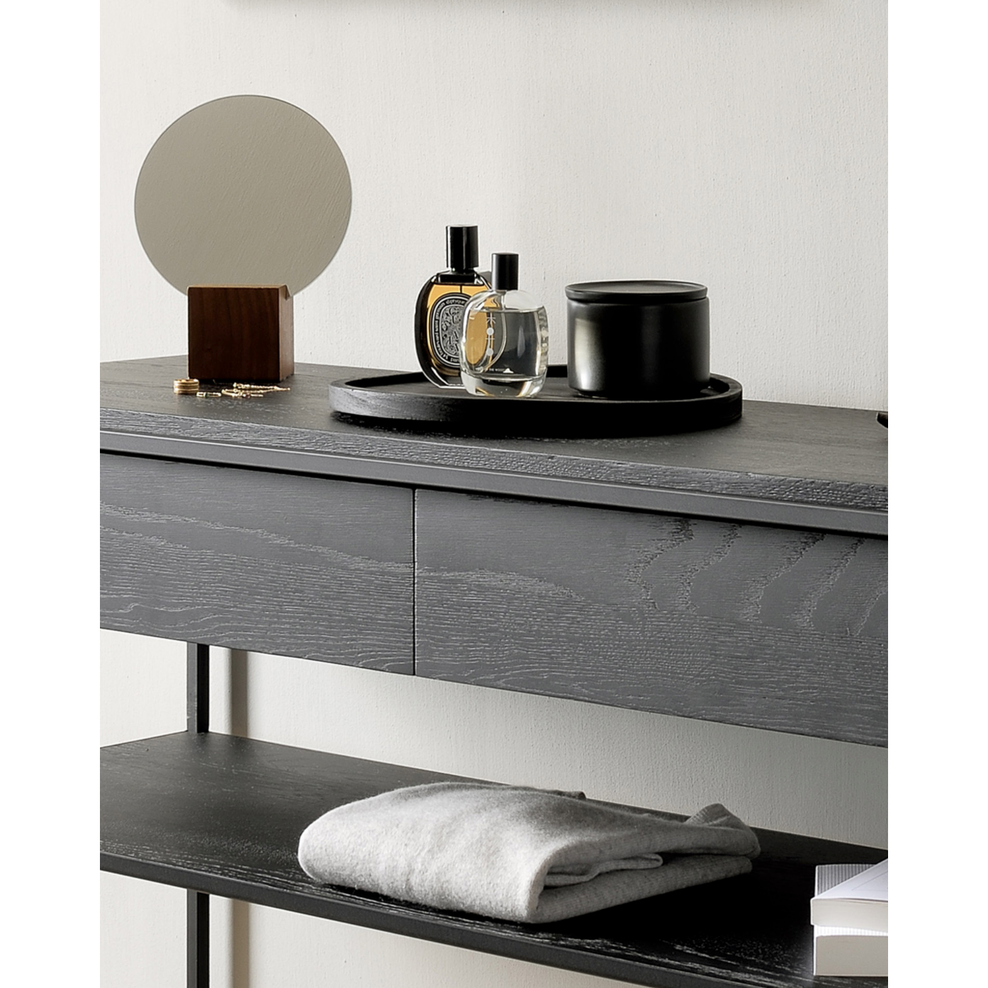 Balance and function come together in the Monolit console table. This simple, sleek table includes storage and we LOVE hidden storage! Dress up your living room or office with a piece that is both functional and stylish!  Dimensions: 48.5"w x 16"d x 33.5"h  Weight: 77 lbs  Material: Oak, 100% solid wood Finish: Varnished