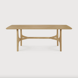 The Nexus dining table, designed by Alain van Havre, is brought to life by creating flow and movement. We love the soft, rounded edges of the table base contrasted with the knife edge top. This table is sure to elevate the feel of your dining space while remaining organic and cozy!  Dimensions: 83"w x 39.5"d x 30"h  Weight: 130 lbs  Dimensions: 91"w x 41.5"d x 30"h Weight: 150 lbs  Material: Oak, 100% solid wood Finish: Oiled