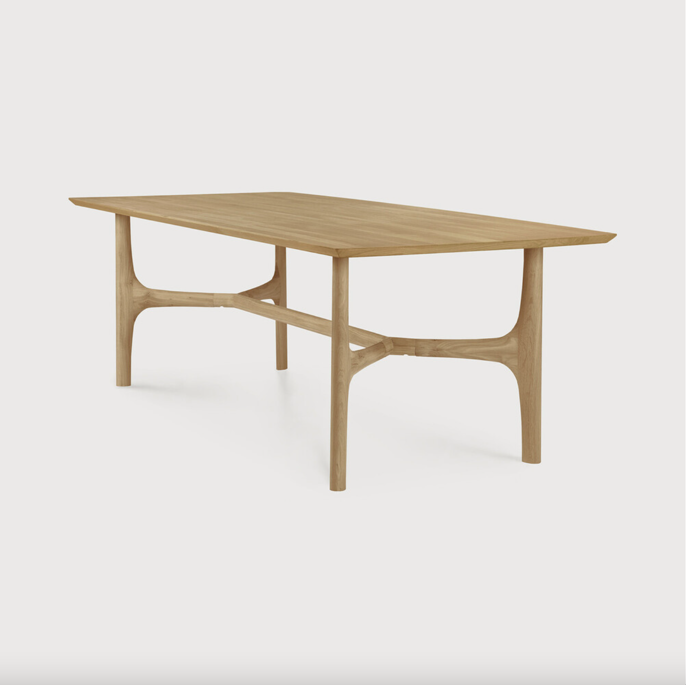 The Nexus dining table, designed by Alain van Havre, is brought to life by creating flow and movement. We love the soft, rounded edges of the table base contrasted with the knife edge top. This table is sure to elevate the feel of your dining space while remaining organic and cozy!  Dimensions: 83"w x 39.5"d x 30"h  Weight: 130 lbs  Dimensions: 91"w x 41.5"d x 30"h Weight: 150 lbs  Material: Oak, 100% solid wood Finish: Oiled