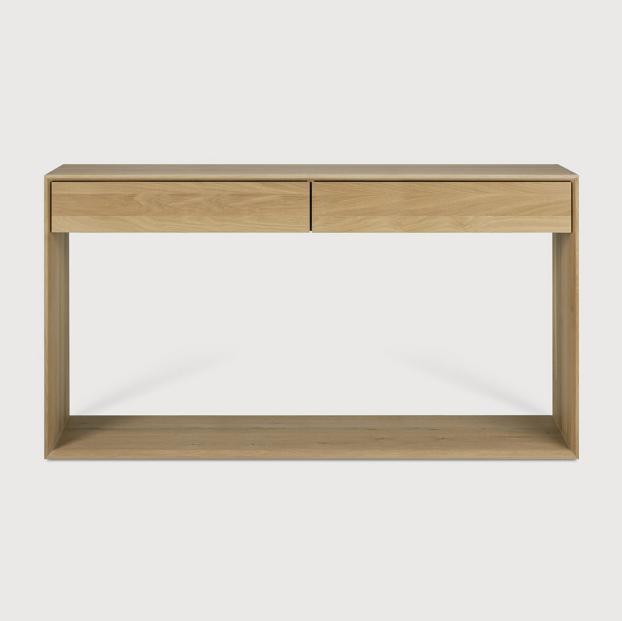 This Oak Nordic Console combines refined design with the purity of solid wood. We love that the bevelled edges will add an upscale aesthetic to any entry hall or living room space.  Dimensions: 47.5"w x 16"d x 33.5"h  Weight: 84 lbs  Dimensions: 63"w x 16"d x 33.5"h  Weight: 108 lbs  Material: Oak, 100% solid wood Finish: Oiled