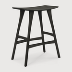 We love the versatility of this Oak Osso Bar + Counter Stool - Black.  A sleek piece to add in your bar area, kitchen island, or a standing desk stool.   Bar Dimensions: 22.5"w x 13"d x 31.5"h Seat Height: 30.5"  Counter Dimensions: 22.5"w x 14.5"d x 24.5"h Seat Height: 23"  Material: Oak, 100% Solid Wood Finish: Varnished